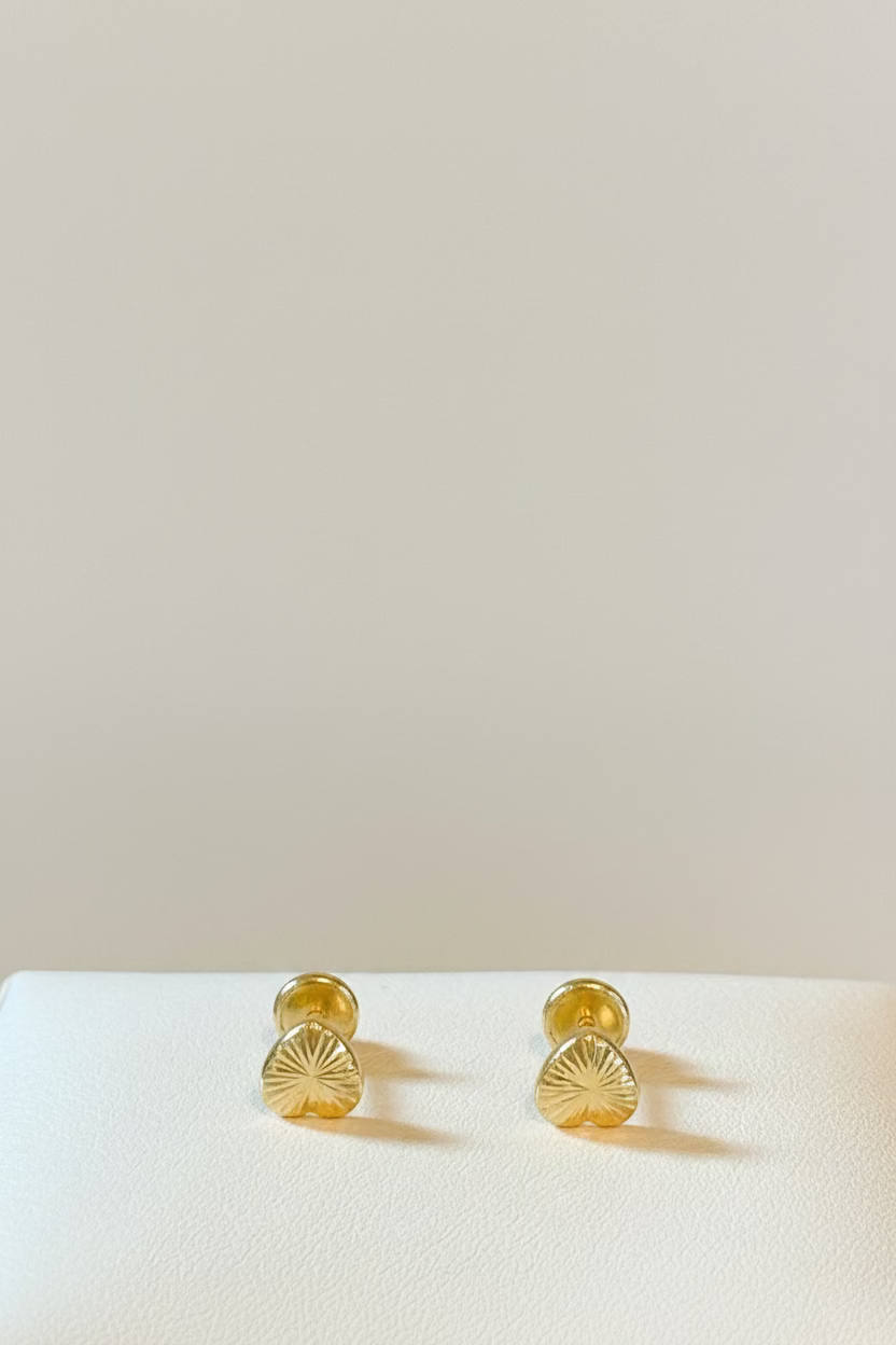 10K heart lined earrings