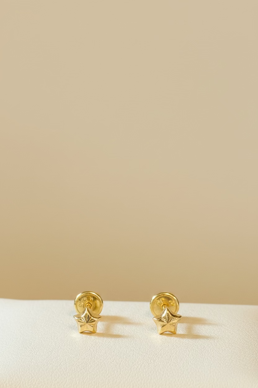 10K small star earrings