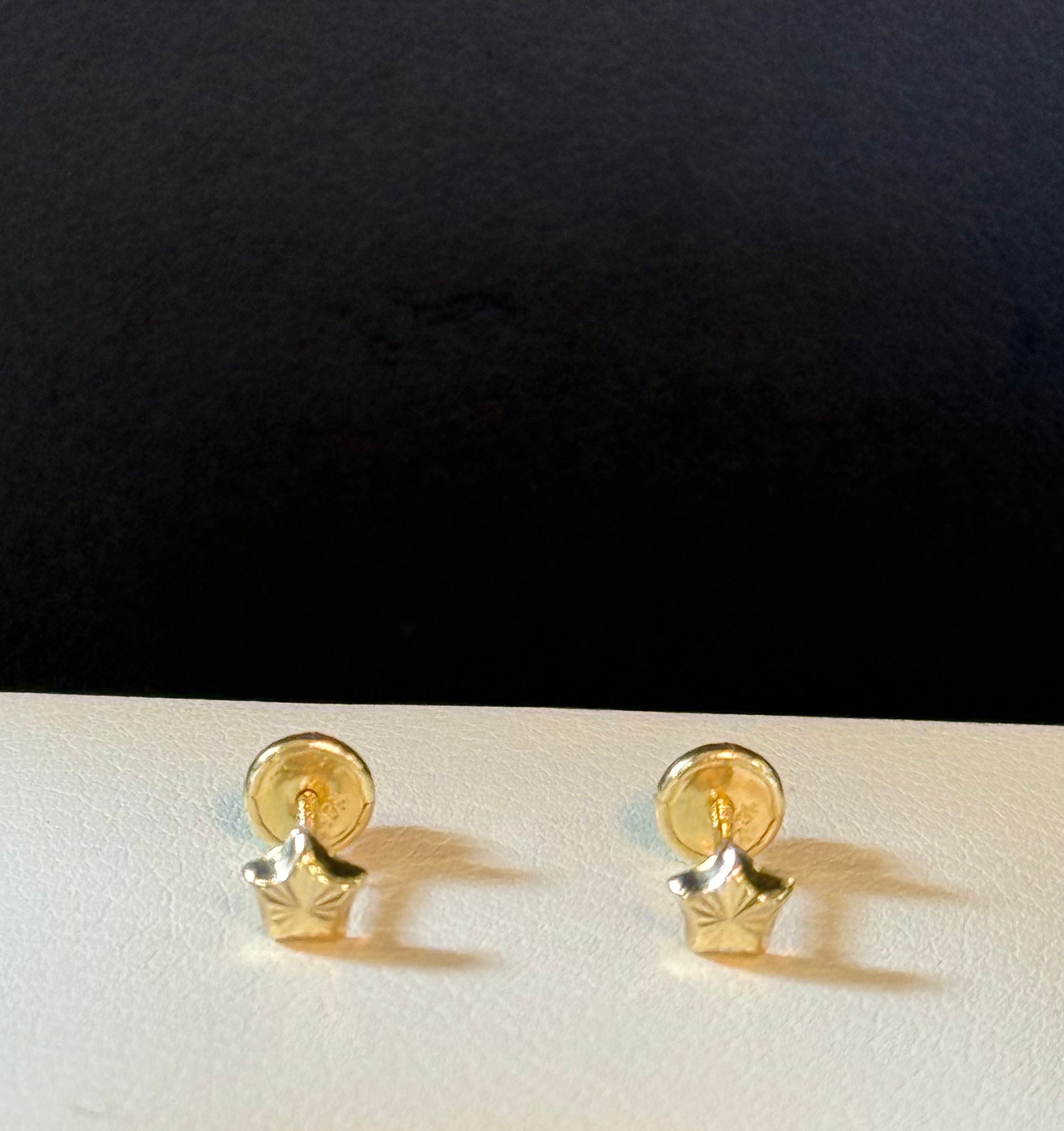 10K small star earrings